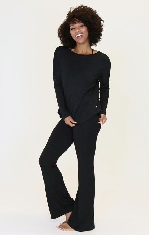 Model is wearing the eco-friendly happy hour pant and fri-nally pullover from JJWinks, shown here in black and made in the USA.