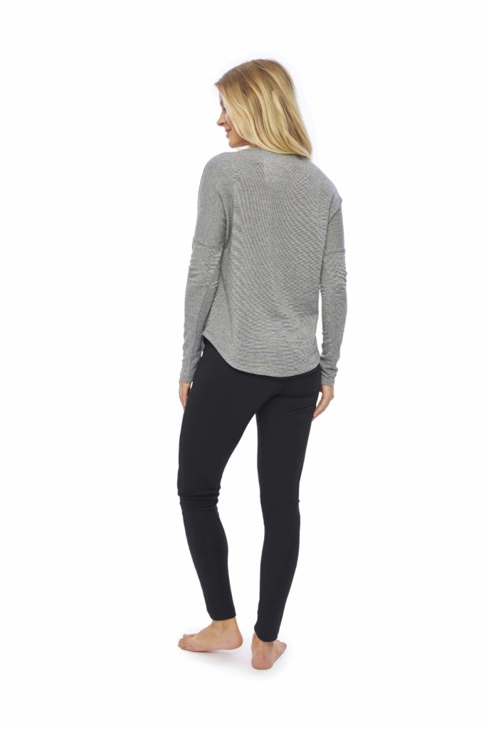 Model is showing the back of a gray heather pullover made from earth-friendly French Terry fabric, by brand JJWinks. Made in USA, this pullover is carbon neutral.