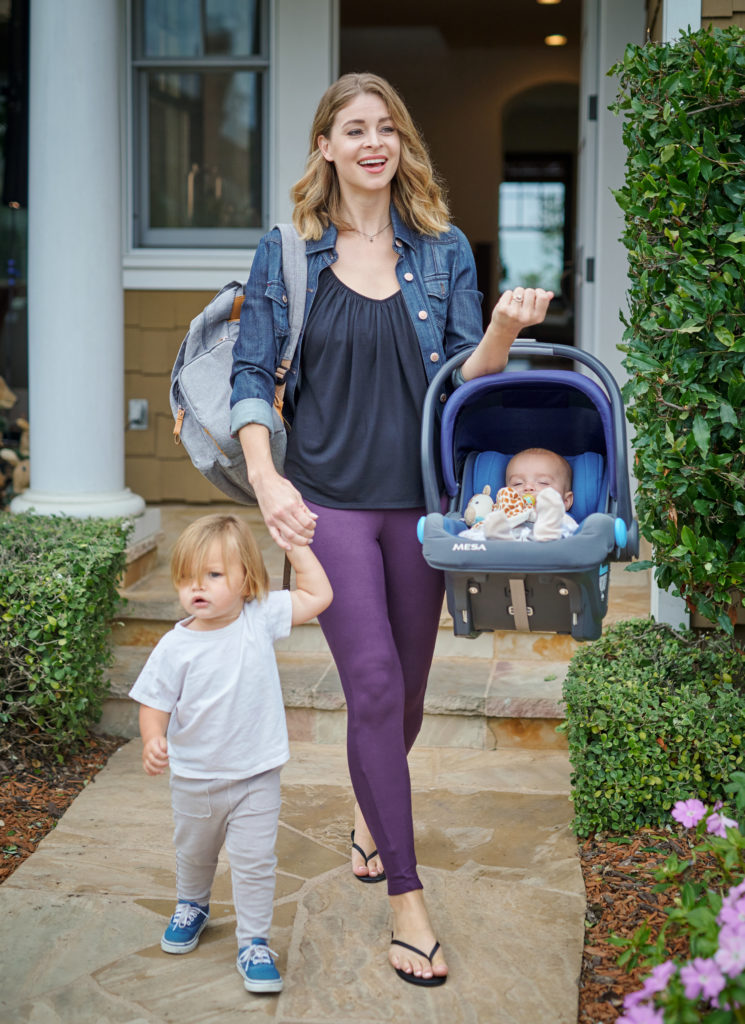 Mom with two young kids wearing sustainable loungewear tank and legging