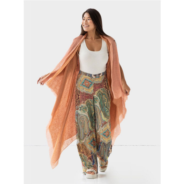 The Artisanal Cape Infinity Duo by Fifth Origins is reversible and is made from earth-friendly organic linen. Each cape purchase empowers women artisans.