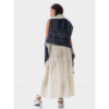 The back of the Artisanal Cape Infinity Duo by Fifth Origins is hand embroidered with an exquisite pattern created by rural Indian artisans. Shown in blue and white and made with eco-friendly organic linen.