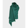 The Artisanal Cape Lite by Fifth Origins, shown here in emerald green, is made from organic wool and is sustainably made. Fifth Origins supports women artisans.