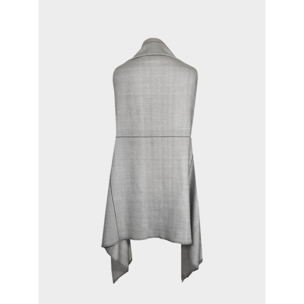 The eco-friendly Artisanal Cape Infinity Lite, shown here in silver, is made from 100% organic Himalayan wool and is woven by women artisans.