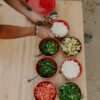 Overhead view of food on sustainable, folding bamboo and aluminum travel table