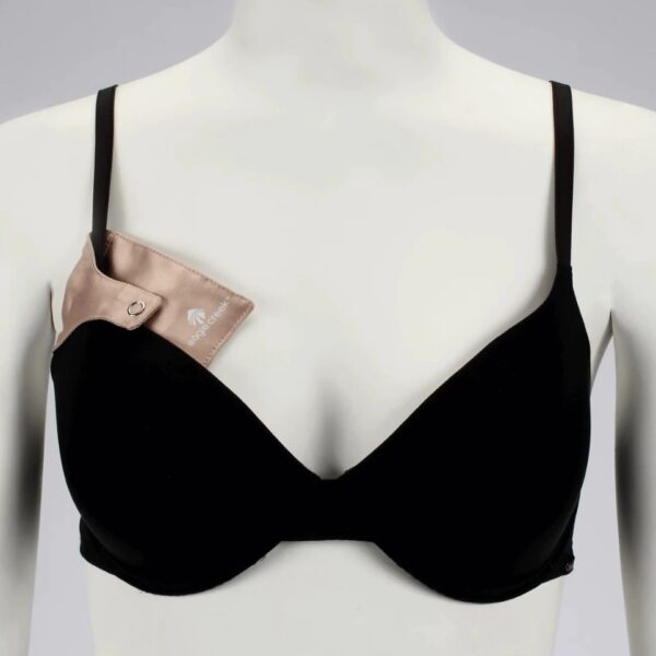 The eco-friendly Silk Undercover Bra Stash by Eagle Creek, shown here in a rose color, is made from natural, washable, breathable silk. It can attach to a bra on a shoulder strap for close-to-body travel security.