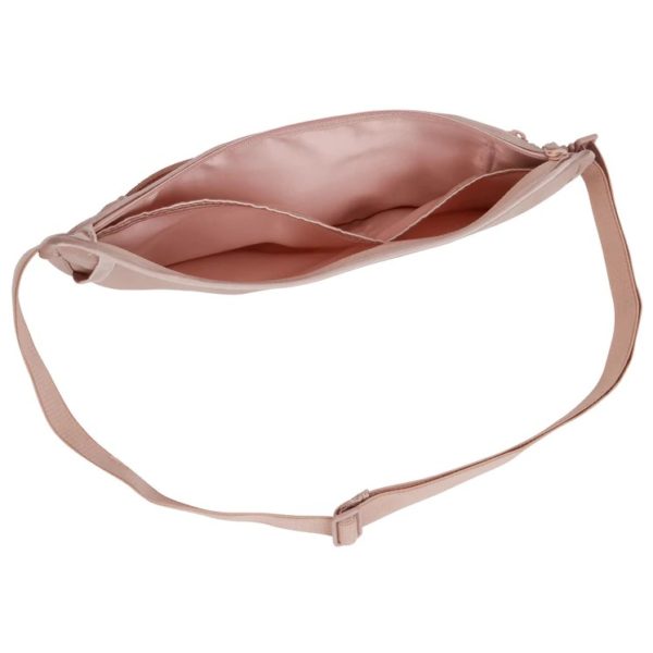 This money belt by Eagle Creek is made from natural silk. Photo shows rose colored money belt open, revealing several compartments for passport, documents, and currency. An earth-friendly travel solution that will keep your belongings safe!