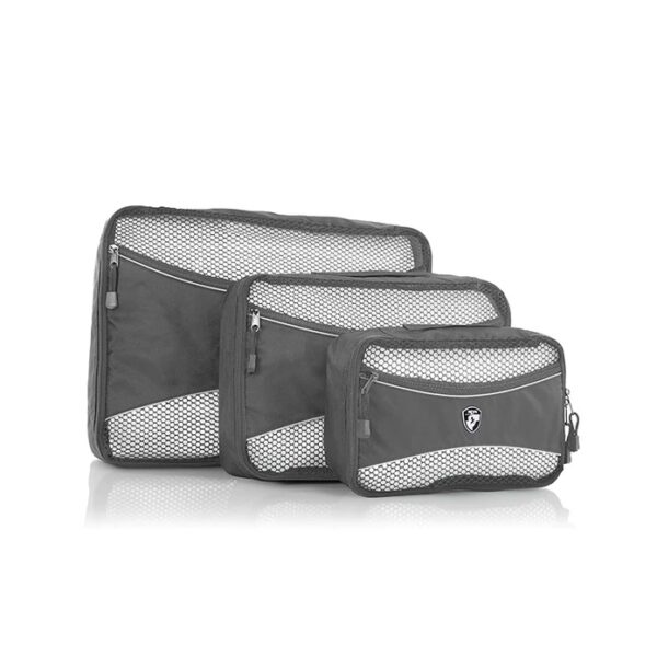 The earth-friendly 3 piece packing cube set, shown here in grey, is made by Heys Luggage using 100% recycled fabric made from landfill-bound plastic bottles. Displayed here in large, medium, and small.