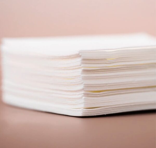 Stack of low-waste, eco-friendly laundry detergent sheets