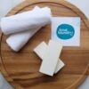 Two vegan, plastic-free stain remover bars from Kind Laundry