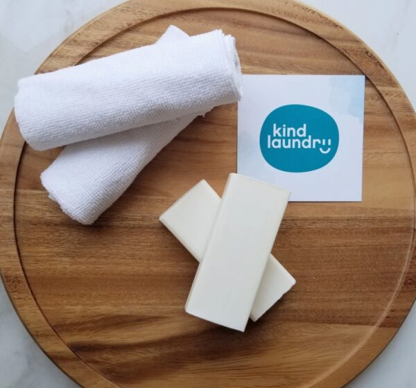 Two vegan, plastic-free stain remover bars from Kind Laundry
