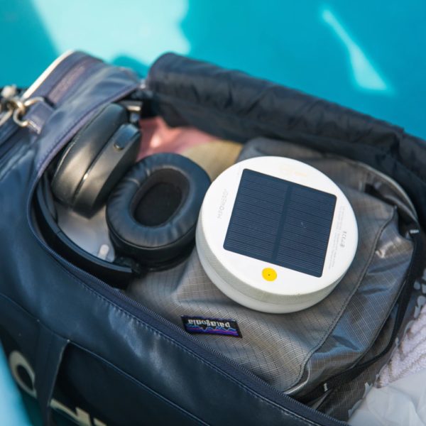 Portable Explore solar powered light and speaker in backpack for sustainable travel