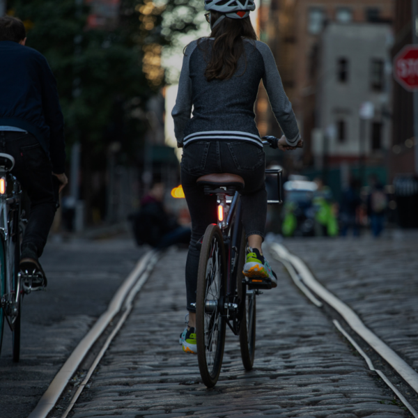 Taillight of solar powered bike light set on city bike trip
