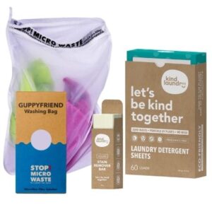 Plastic-free laundry kit set with detergent sheets, stain remover bar and Guppy Friend wash bag.