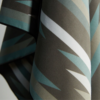 The Ultralight quick dry towel by Nomadix, shown here in close up in Jackson Green, is made from post consumer recycled materials and has a micro suede texture.
