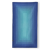 The Ultralight quick dry towel by Nomadix, shown here in Zone Teal, is made from post consumer recycled materials and is eco-friendly.