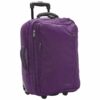 The earth-friendly 20 inch Hybrid Carry-on by LiteGear, shown here in purple, has padded handles and is made from recycled, ocean-bound plastic bottles.