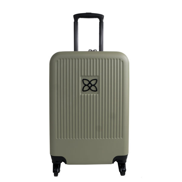 The Meridian luggage by Sherpani, shown here in sage green, has a sage front and a black back with black wheel and black accents.