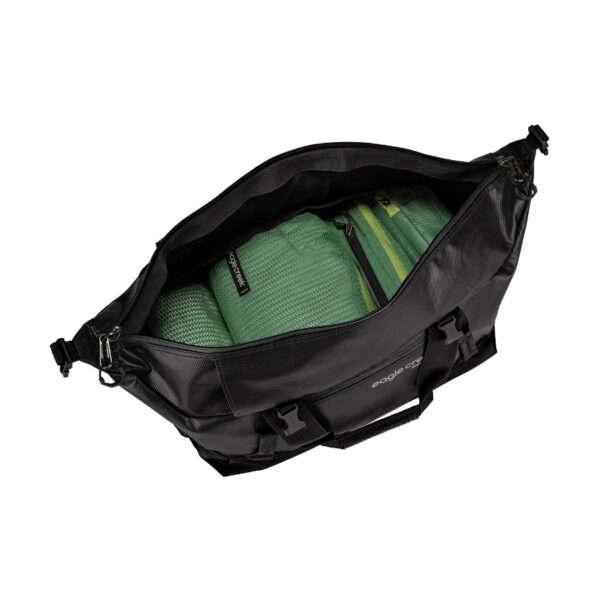 The sustainable migrate duffel bag by Eagle Creek, shown here in all black, is a 90 liter duffel bag that is made from durable and weather-resistant recycled materials. It can be used easily with Eagle Creek packing cubes.