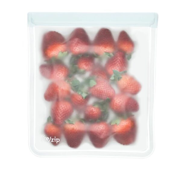 Strawberries pictured in reusable, low waste gallon leak-proof bag.