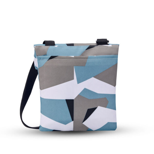 The back of the eco-friendly Sherpani Pica crossbody bag shown with a geometric Summer Camo print in black, blue, and white.