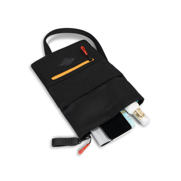 The Sherpani Pica crossbody bag, shown here in Chromatic black with orange zipper and bright red zipper pull, is sustainably-made and has 5 pockets for all your gear.