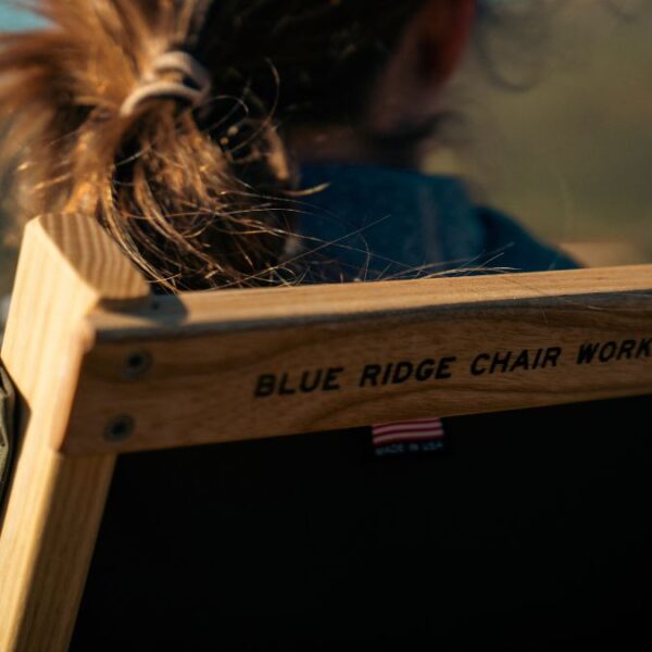 Close up view of back of hand-crafted, wood Blue Ridge travel chair