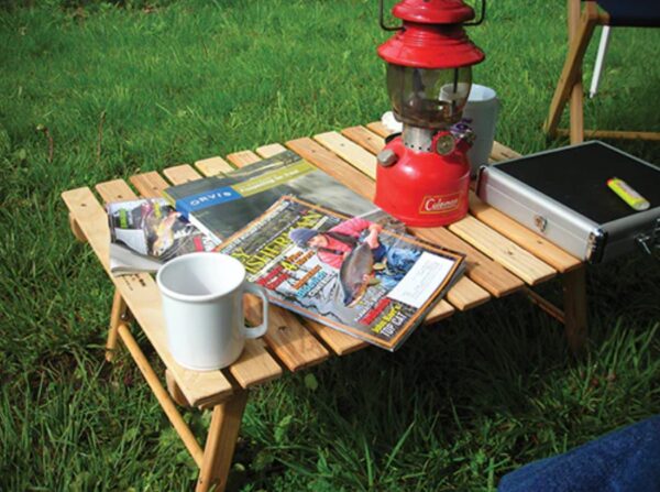 Outdoor, wood foldable travel table with camping items