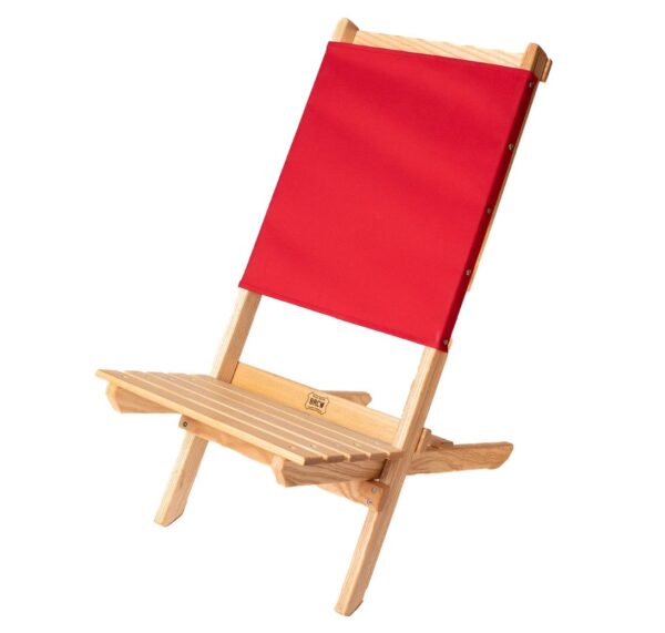 Sustainable wood, folding travel chair with red back