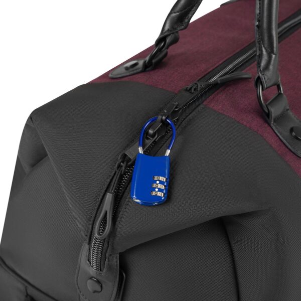 The sustainable Trip rolling duffel bag, shown here in merlot and black, is made of recycled fabrics. The hardware, including the zipper pulls with opening to feed a lock through, are durable and made to last.