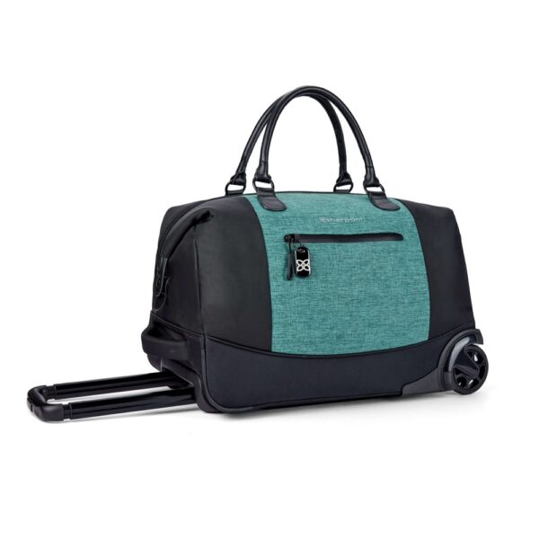 The Trip rolling duffel bag, shown here in teal and black, is made of recycled fabrics and can be carried as a duffel or a roller bag.
