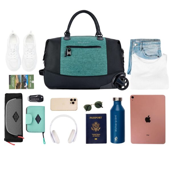 The sustainable Trip rolling duffel bag, shown here in teal and black, can fit all of your essentials including shoes, outfits, headphones, tablet, water bottle, and wallet.