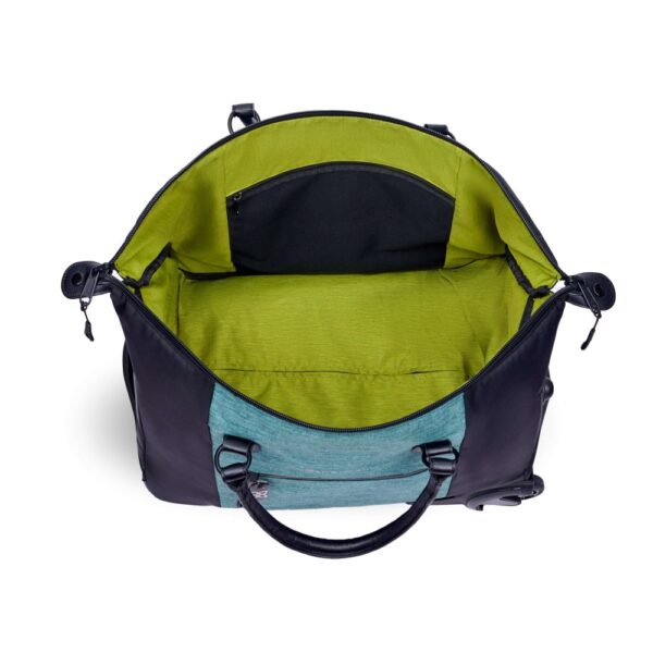 The Trip rolling duffel bag, shown here in teal and black, is made of recycled fabrics and can be carried as a duffel or a roller bag. This sustainable bag is shown with a lime green interior and many functional zippered pockets.