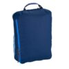 Back view of blue clean dirty packing cube for eco-friendly travel and packing hacks