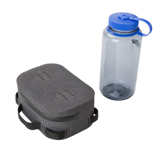 Small waterproof dry cube make of recycled materials next to water bottle