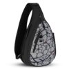 The Esprit AT Shoulder Sling bag is seen here in Sakura pattern. It has a black back with a gray and black flowery-looking patterned front.