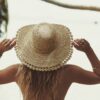 This shows a view from the top of the natural colored Amy Summer Raffia Hat. This is made from hand-braided organic raffia. There's a wide brim that offers sun protection and a vented crown that allows for cool air flow. This hat only comes in one color and one size.