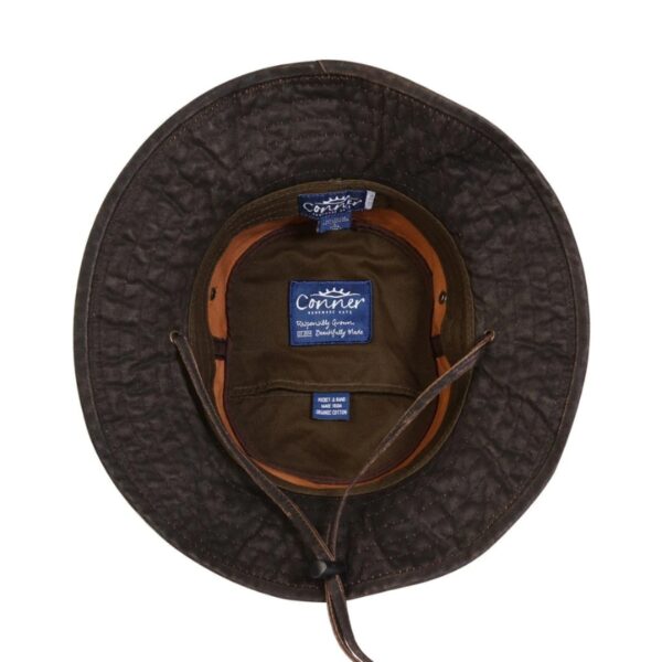 This shows the inside part of the Dusty Road Aussie Waterproof Cotton Hat. It comes in one color, brown. It offers 50+ UPF protection. It's made with weathered cotton and comes in 5 sizes: small, medium, large, x-large, xx-large.